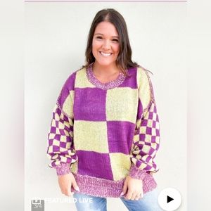 Fantastic fawn ready to roll sweater, size medium, purple and yellow